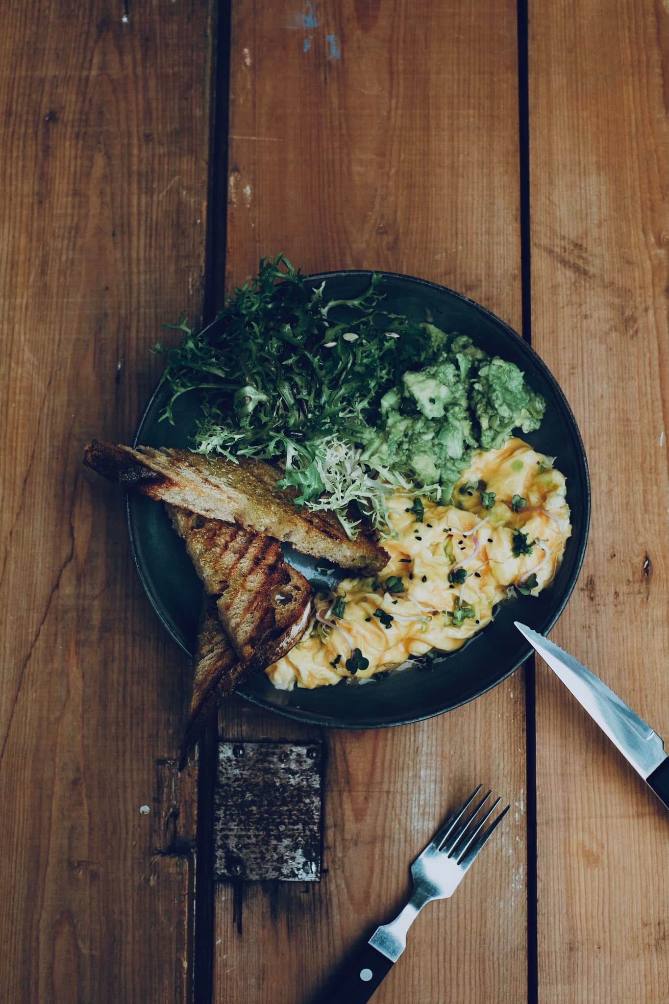 Scrambled avocado breakfast with coffee at Factory Girl