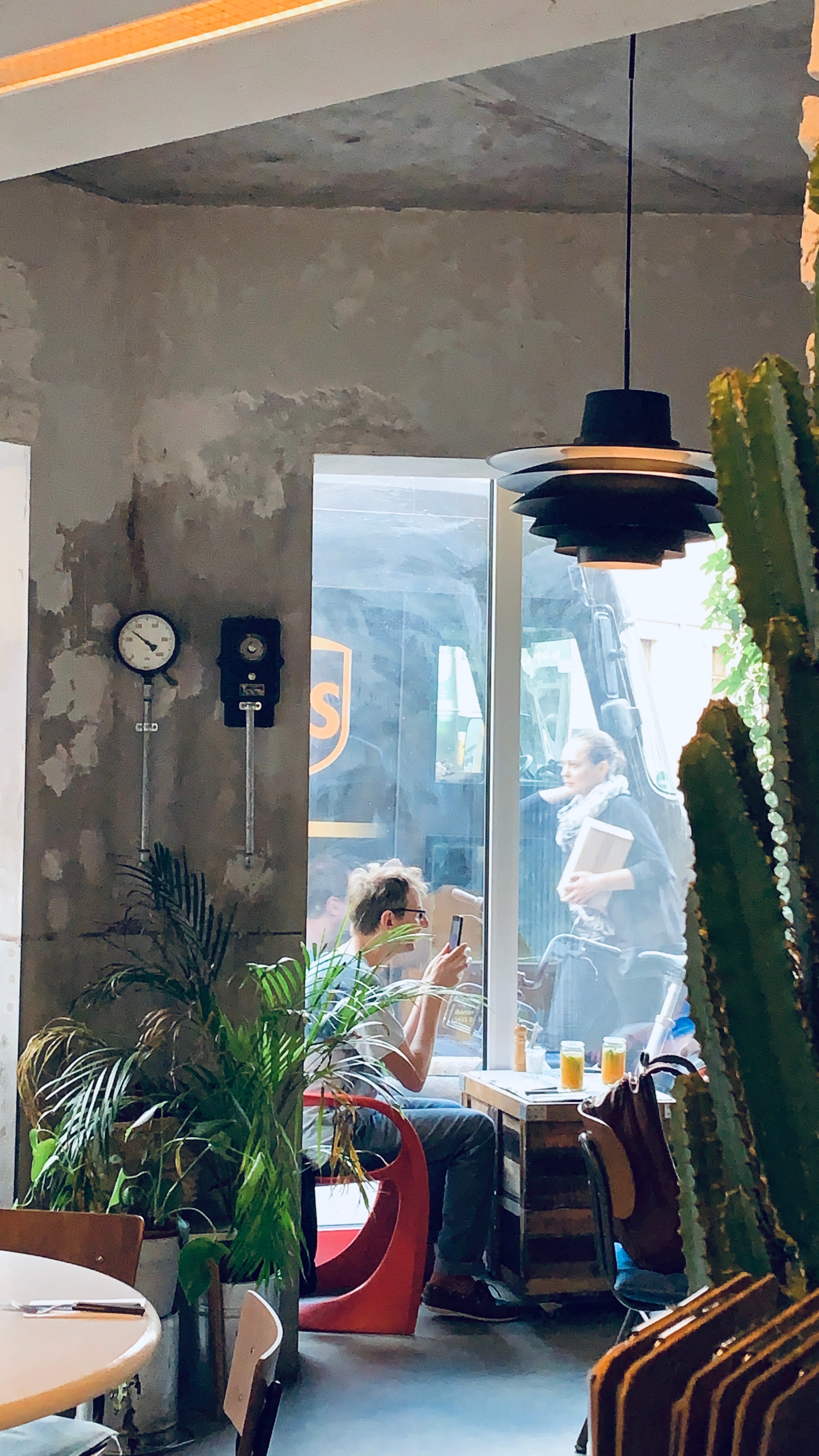 Factory Girl dining room with concrete walls and daylight
